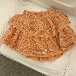 Famous Arie skirt with an adorable floral pink and orange pattern in size small!